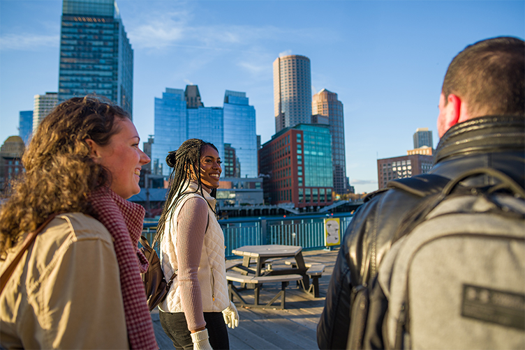 UNH changemaker collaborative students walk on boston waterfront