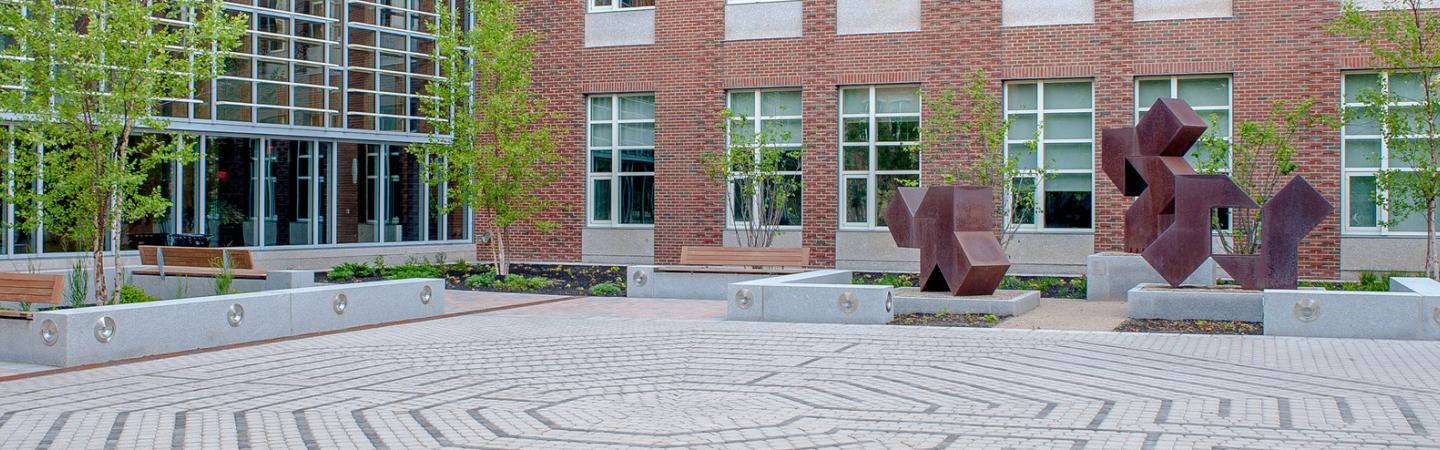 Paul College Courtyard showing the labyrinth and large artwork sculptures 