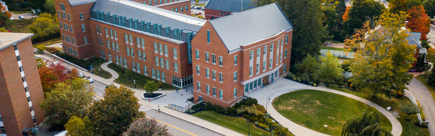 The outside of Paul College as viewed from a drone in fall