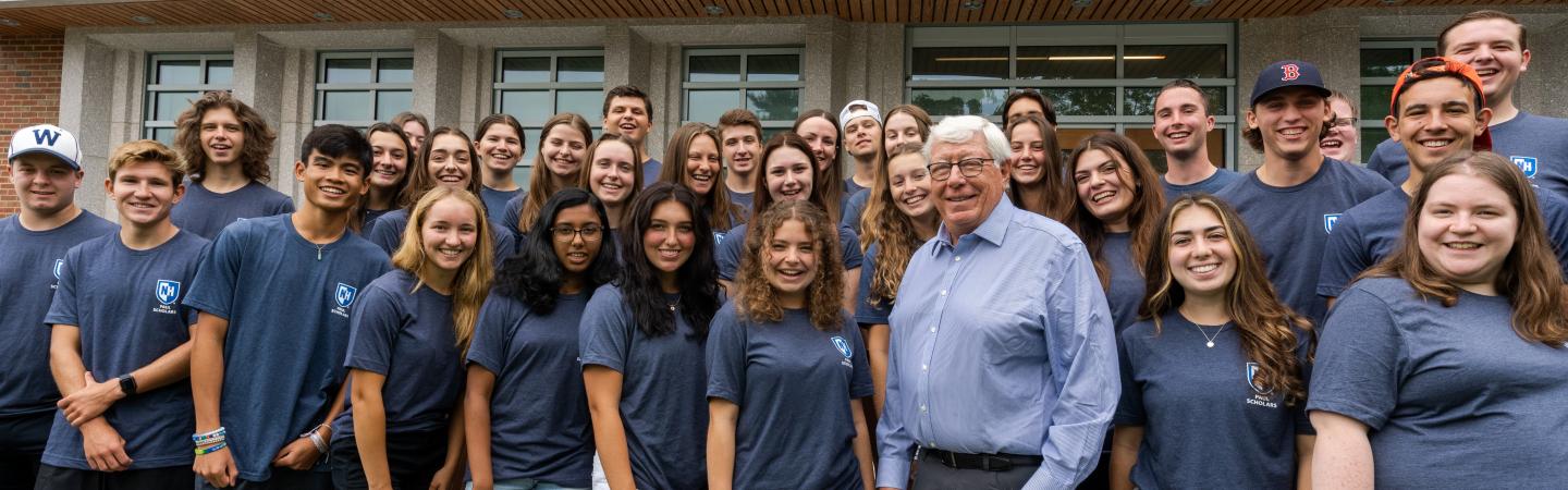 The 2022-23 Paul Scholars pose for a photo with Peter T. Paul
