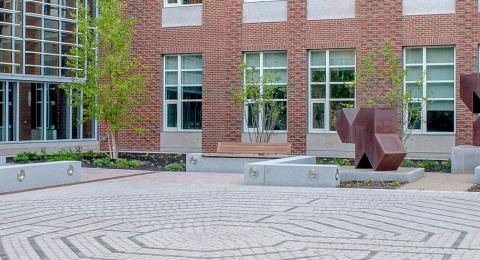 Paul College Courtyard showing the labyrinth and large artwork sculptures 