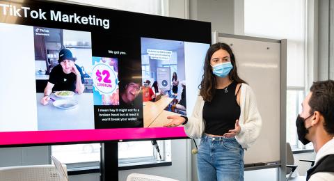 A student presenting on tiktok marketing techniques