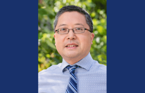 UNH Paul College Associate Professor Jun Li headshot