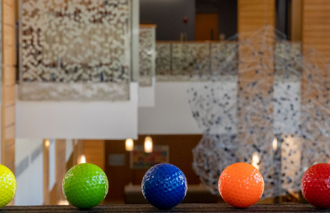 photo of mini golf balls overlooking Paul College Great Hall to use for event promotion