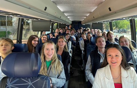 PSG students on the bus to the ALKU UNH Sales Elite Series Competition