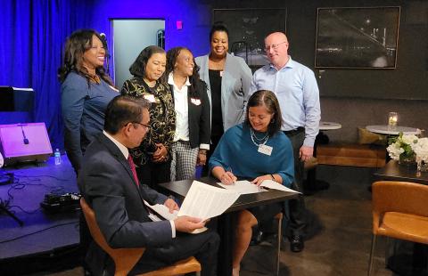 NH SBDC and the Business Alliance for People of Color (BAPOC) witness the signing a Memorandum of Understanding to officially mark their partnership to support BIPOC NH small businesses.