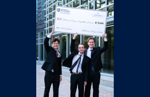 Holloway winners holding check