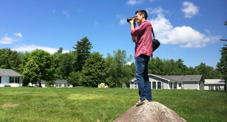 Kris Roller '15 takes photos of a manufactured home community as part of his social innovation internship with ROC USA during the summer of 2014.