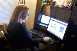 Jennifer-Cardoza,-working-at-home-for-her-job-in-the-marketing-department-at-John-Hancock-Investment-(Jim Michaud / MediaNews Group/Boston Herald)