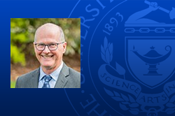 unh president, James W. Dean Jr. and blue seal