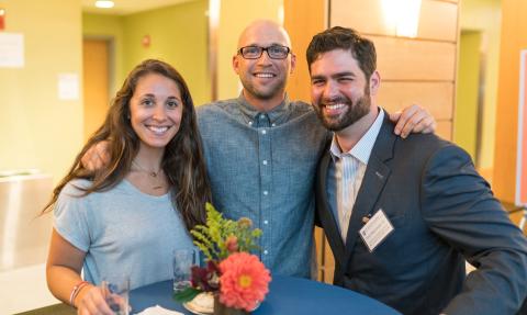 Paul College Homecoming reception attendees smiling for the camera 