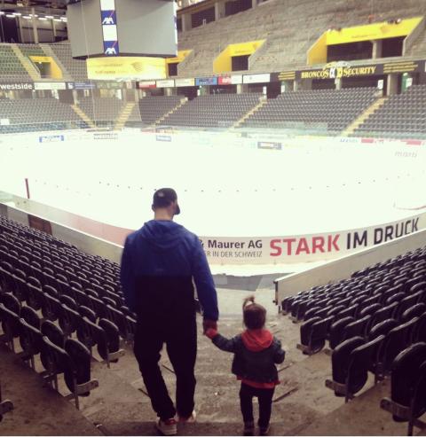 Trevor Smith and Daughter in a hockey rink