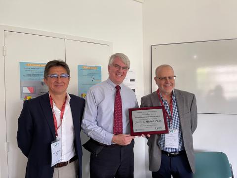 Dr. Steven C. Michael receives 2023 ISOF RIFC Award with Dr. Hachemi Aliouche