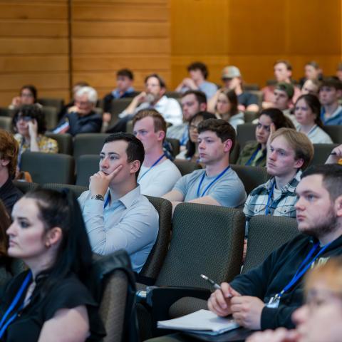 UNH students listen to the Hogan Lecture.