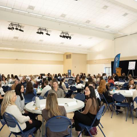 Students network at the UNH Women in Sales event