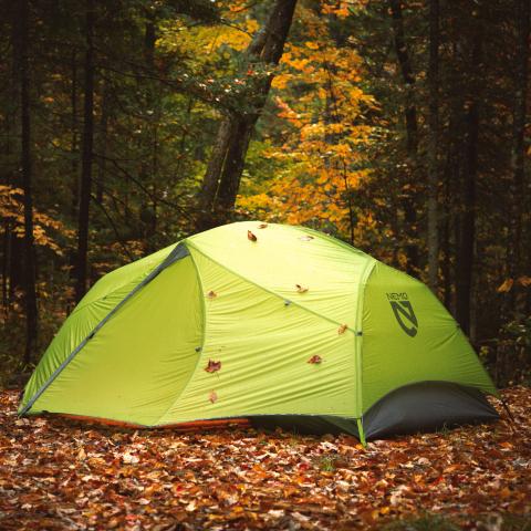 photo of NEMO tent in the woods in the fall