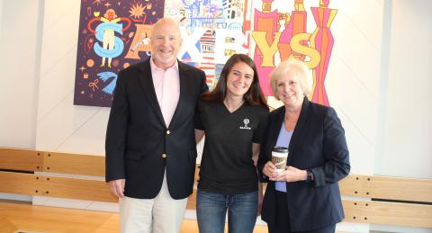 Crowe poses with Paul College hospitality management chair Nelson Barber and Dean Deborah Merrill-Sands at the Saxbys Durham grand opening